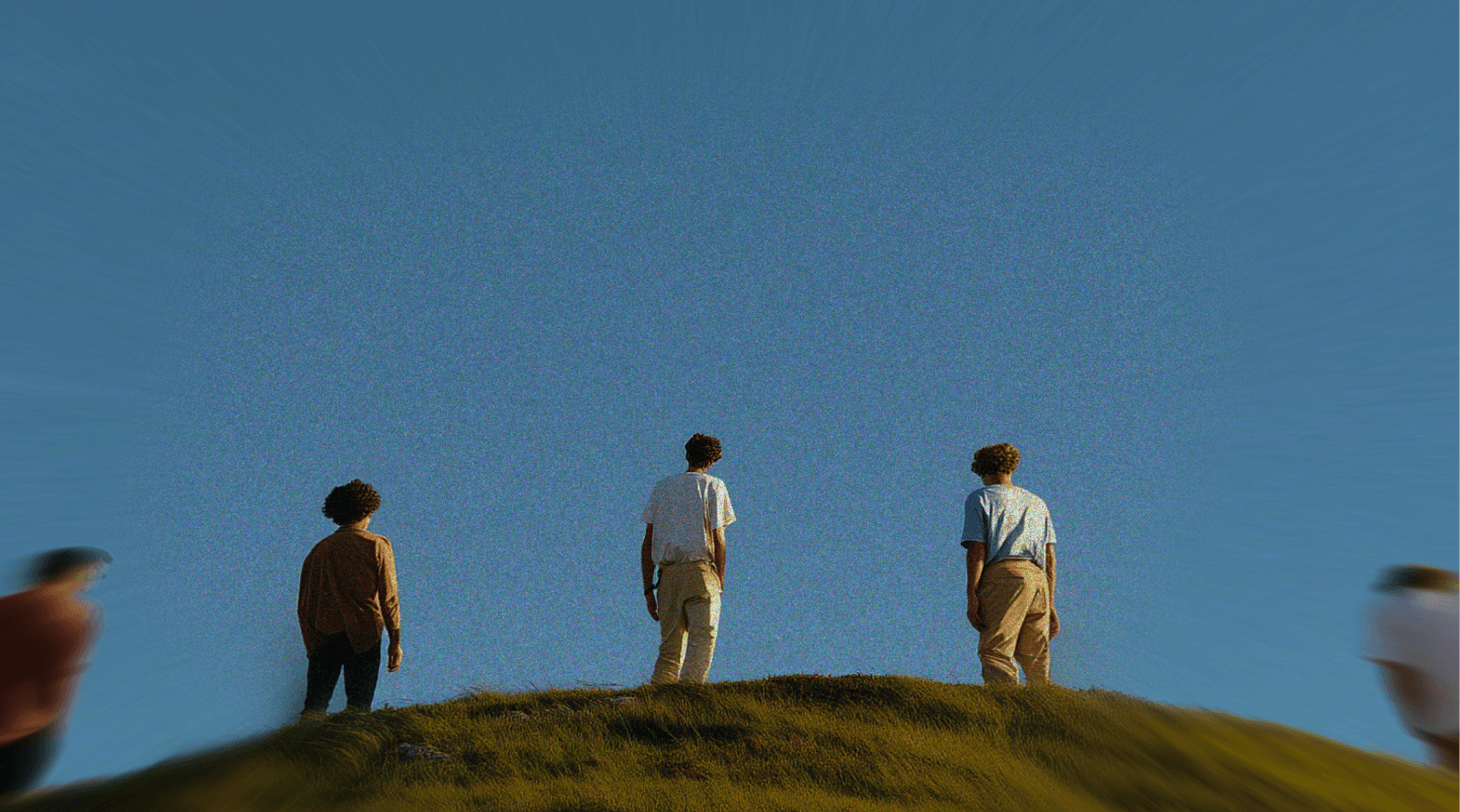 Open AGI community members standing together beneath an open sky